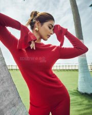 Ravishing Pooja Hegde in a Red Flare Sleeve Top and Trousers Photos 02