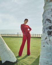 Ravishing Pooja Hegde in a Red Flare Sleeve Top and Trousers Photos 03
