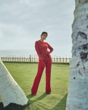 Ravishing Pooja Hegde in a Red Flare Sleeve Top and Trousers Photos 03