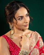 Ravishing Rakul Preet Singh in a Royal Red Saree with a Matching Sleeveless Blouse Pictures 03