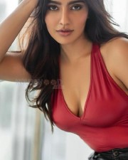 Red Hot Neha Sharma in Black Satin Pant and Red Cleavage Neck Top Photos 02