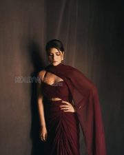Regal Actress Aishwarya Rajesh in a Maroon Draped Saree Photos 02