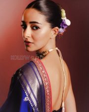 Regal Actress Ananya Panday in a Royal Blue Banarasi Saree and Black Strapless Blouse Photos 02