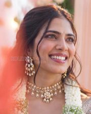 Resplendent Actress Malavika Mohanan in a White Lehenga with Polki Gold Jewelry Photos 01
