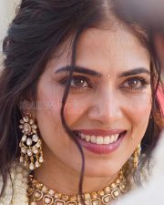 Resplendent Actress Malavika Mohanan in a White Lehenga with Polki Gold Jewelry Photos 04
