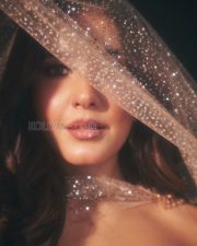 Resplendent Actress Raashi Khanna in a Gold Glitter Cape Gown Photos 02
