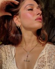 Resplendent Actress Tamanna Bhatia in a Cream Crochet Top Photos 01
