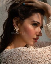 Resplendent Actress Tamanna Bhatia in a Cream Crochet Top Photos 04