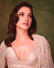 Resplendent Actress Tamanna Bhatia in a White pearl embellished corset and pearl cape Photos 03