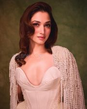 Resplendent Actress Tamanna Bhatia in a White pearl embellished corset and pearl cape Photos 04