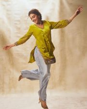 Revolver Rita Heroine Keerthy Suresh in a Lime Green Velvet Kurta and Light Denim Jeans Pictures 02