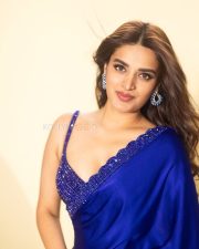 Riveting Actress Nidhhi Agerwal in a Royal Blue Satin Saree With Crystal Blouse Photos 05