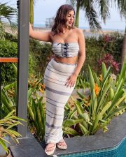 Sakalakala Valli Yashika Aannand in a Beach Striped Crochet Bandeau Style Tie Up Crop Top with a Crochet Maxi Skirt Photos 08 Sakalakala Valli Yashika Aannand in a Beach Striped Crochet Bandeau Style Tie Up Crop Top with a Crochet Maxi Skirt Photos 08