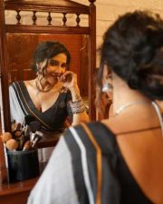 Sakshi Agarwal in a Black and Grey Saree Photoshoot Pictures 01