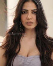 Scorching Beauty Malavika Mohanan in an Off Shoulder Cleavage Showing Dress Photos 02