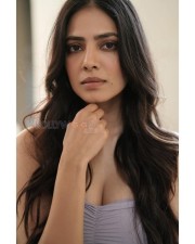 Scorching Beauty Malavika Mohanan in an Off Shoulder Cleavage Showing Dress Photos 05