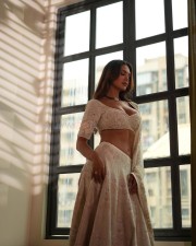 Scorching Esha Gupta Showing Cleavage in a White Choli Pictures 01