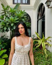 Seductive Malavika Mohanan Cleavage in a Sleeveless Star Print Short Skirt Photos 04 Seductive Malavika Mohanan Cleavage in a Sleeveless Star Print Short Skirt Photos 04
