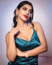 Seductive Yashika Aannand in a Teal Satin Thigh Slit Bodycon Dress Photos 04