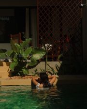 Sensual Anikha Surendran in a Two Piece Blue and White Striped Vacation Bikini Pictures 01