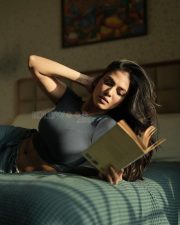 Sensual Malavika Mohanan in a Black Turtle Neck Top with Classic Blue Denim Lying on the Bed Photos 04 Sensual Malavika Mohanan in a Black Turtle Neck Top with Classic Blue Denim Lying on the Bed Photos 04