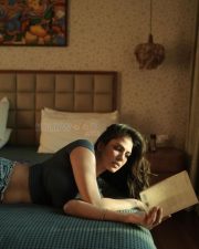 Sensual Malavika Mohanan in a Black Turtle Neck Top with Classic Blue Denim Lying on the Bed Photos 08 Sensual Malavika Mohanan in a Black Turtle Neck Top with Classic Blue Denim Lying on the Bed Photos 08