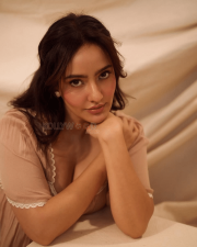 Sensual Neha Sharma Cleavage in a Beige Lace Trim Mini Dress Photos 02