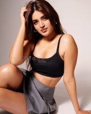 Sensual Nidhhi Agerwal Legs in a Black Crop Tank Top Grey Mini Shorts Black Thigh High Stockings Photos 02