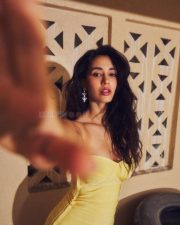 Sensuous Actress Disha Patani in a Yellow Strapless Bandage Mini Dress Pictures 04