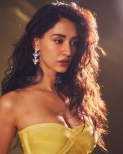 Sensuous Actress Disha Patani in a Yellow Strapless Bandage Mini Dress Pictures 05