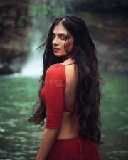 Sensuous Malavika Mohanan in a Bold Red Blouse with Matching Red Skirt Standing in Front of a Waterfall Photoshoot Pictures 01 Sensuous Malavika Mohanan in a Bold Red Blouse with Matching Red Skirt Standing in Front of a Waterfall Photoshoot Pictures 01