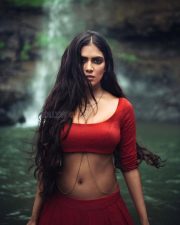 Sensuous Malavika Mohanan in a Bold Red Blouse with Matching Red Skirt Standing in Front of a Waterfall Photoshoot Pictures 02 Sensuous Malavika Mohanan in a Bold Red Blouse with Matching Red Skirt Standing in Front of a Waterfall Photoshoot Pictures 02