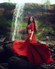Sensuous Malavika Mohanan in a Bold Red Blouse with Matching Red Skirt Standing in Front of a Waterfall Photoshoot Pictures 07 Sensuous Malavika Mohanan in a Bold Red Blouse with Matching Red Skirt Standing in Front of a Waterfall Photoshoot Pictures 07