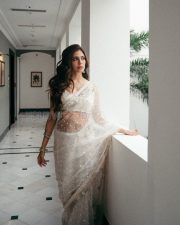 Serene Actress Malavika Mohanan in a White embroidered net saree Photos 02 Serene Actress Malavika Mohanan in a White embroidered net saree Photos 02