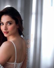 Serene Actress Tamannaah in a white lace bralette knit cardigan cream trousers Photos 02 Serene Actress Tamannaah in a white lace bralette knit cardigan cream trousers Photos 02