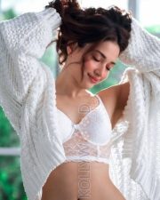 Serene Actress Tamannaah in a white lace bralette knit cardigan cream trousers Photos 05 Serene Actress Tamannaah in a white lace bralette knit cardigan cream trousers Photos 05