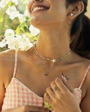 Sexy Actress Priya Prakash Varrier in a Pink and White Checked Dress Photos 02