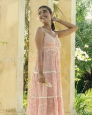 Sexy Actress Priya Prakash Varrier in a Pink and White Checked Dress Photos 03