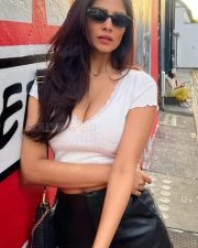 Sexy Beauty Malavika Mohanan in a White Crop Top Cleavage Photos 01