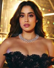 Sexy Diva Janhvi Kapoor in a Black Off Shoulder See Through Lace Fish Cut Gown with a Diamond Necklace Photos 01