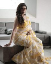 Sexy Honey Rose in a White Yellow Saree Photo 01