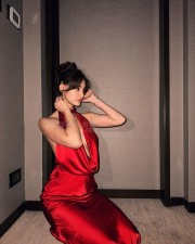 Sexy Hot Disha Patani in a Red Backless Satin Gown with Cleavage Neckline Photos 06
