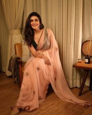 Sexy Hot Karishma Tanna in a Light Pink Transparent Saree with a Black Sleeveless Cleavage Blouse Pictures 02