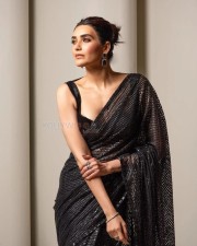 Sexy Karishma Tanna in a Black Shimmery Saree with a Sleeveless Blouse Photos 02