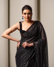 Sexy Karishma Tanna in a Black Shimmery Saree with a Sleeveless Blouse Photos 03