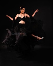 Sexy Karishma Tanna in a Golden Shimmering Black Saree Photos 01