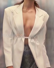 Sexy Kiara Advani in a Jacquemus white jacket and a mini silver bling skirt with a slit from Monisha Jaising Photos 03
