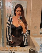 Sexy Malavika Mohanan Mirror Selfie in a Black Corset and Striped Shirt Photos 02 Sexy Malavika Mohanan Mirror Selfie in a Black Corset and Striped Shirt Photos 02