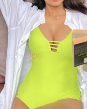 Sexy Malavika Mohanan in a Neon Green Swimsuit Photos 02