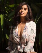 Sexy Malvika Sharma in a White Wrap Style Floral Printed Mini Dress with a Deep Cleavage Photos 02